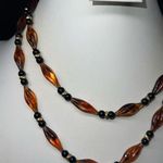 Monet Vintage  Faux Amber and Black Plastic Bead Barrel Closure Necklace 36” Photo 1