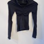 SKIMS Posted 44m ago Seamless Sculpt - ZIP FRONT LONG SLEEVE T-SHIRT Onyx S/P New/ Unboxed Photo 7