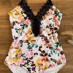 One piece sexy bathing suit xl plunging never worn Photo 0