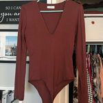 Vestique  bodysuit Photo 0