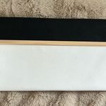 Ann Taylor  black and white magnetic clutch with gold trimming Photo 0
