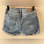 American Eagle Women’s Super Super Stretch Distressed Denim Midi Shorts Photo 5