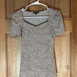 EXPRESS  Black and White Fitted Short Sleeve Blouse size XS  Photo 0