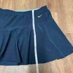 Nike  Womens Solid Navy Blue Dri-Fit Tennis Skirt Size Medium Yellow Swoosh Check Photo 5