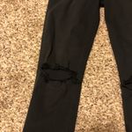 Reformation ❤️  black skinny jeans with knee rips Photo 3