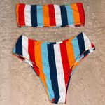 Striped, multicolored, and strapless bikini in size small Photo 0