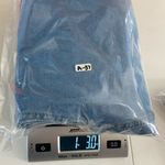 EUC Women’s medium/light wash blue stretch flare leg distressed‎ hem jeans XL Photo 6