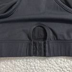 Gymshark  non stop sports bra black size medium size pocket zips front clasps bck Photo 7
