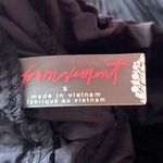 Free People Movement NWT--THE WAY HOME JOGGERS-BLACK-SIZE SMALL-MSRP $60 Black joggers, wide smocked waistband, pull on style, front hip pockets, 100% nylon, brand new with tags Measurements: Waist: side to side 14-17 inches Inseam: 28 inches  Photo 7