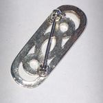 Elegant Vintage Silver Tone Rhinestone Infinity Brooch Photo 3