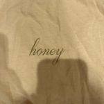 Brandy Melville  honey shirt NWT Photo 1