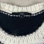 Tibi  Black and White Geometric Sweater with Blue Accents
Size: Small Photo 1