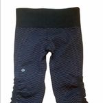 Lululemon in the flow crop rushed sides seamless black & purple stripes size 4 Photo 2