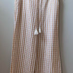 Majorelle  Theo gingham check print tan and cream wide leg pants w/ tassel detail Photo 0