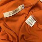 Pumpkin Orange Mock Neck Short Sleeve Shirt Photo 5