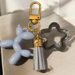 Gold and Blue Balloon Dog Keychain Photo 0