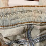 American Eagle  Outfitters whitewash holey and frayed ankle Jeans Photo 4