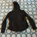 Athleta jacket dark black large soft furry inside heavy and warm Photo 0