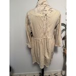 Free People  Textured Gauze Babydoll Tunic Top Beige XS Smocked Button Back Photo 1