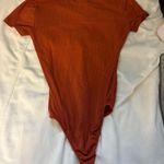 Rue 21 bodysuit  Photo 1