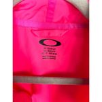 Oakley  pink zip up jacket women’s size small Photo 4
