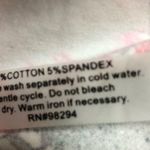 TIO Thomas and Olivia sweater 95 cotton, five spandex three Photo 2