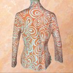 Reversible adorable jacket! From peach/white to aqua/white in one flip motion! Orange Size undefined Photo 6