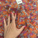 Free People NEW NWT  nina printed top in tulip ditsy orange floral bell sleeve Photo 9