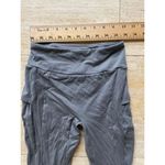 Gymshark High-Waisted Athletic Leggings with Side Pockets Workout Gray S Photo 1