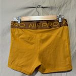 Nike  Pro Women's Training Shorts DQ5599-727 Gold Suede Ale Brown Photo 1