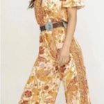 Free People EUC  Carmen Jumpsuit Off Shoulder Floral Wide Leg Size S Photo 0