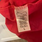 Hot pink blouse w/ lace polka dot sleeve detail Size L Photo 6