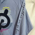 Peloton  hoodie (t-shirt like material) blue with hood and front zip size Medium Photo 6