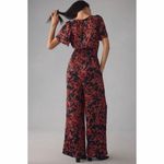 Anthropologie  The Somerset Satin Jumpsuit in Black Red Print Photo 1