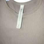 Babaton The group  Aritzia Tan Ribbed Seamless Teee Short Sleeve Bodysuit Medium Photo 1