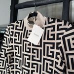 Balmain Ivory & Noir Monogram Shoulder Pad Knit Mini Dress Photo 7