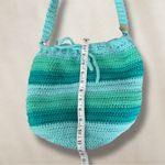 Handmade  Crochet Bucket Bag and Accessory Set: Glasses & Cosmetic Pouch Keychain Photo 7