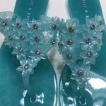 Kelly & Katie  Women’s Allira Blue Floral Rhinestones Jelly Thong Sandals Photo 1