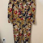 MOTHER The Puffy Wrapper Floral Denim Jumpsuit Flowers in Her Hair L Tan Size L Photo 0