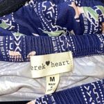 Derek Heart Floral short sleeve romper with cutouts on sleeves Photo 3