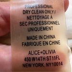 Alice + Olivia Cream Peplum Top Photo 7