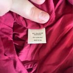 Vava by Joy Han VaVa By Joy Han Red Cold Shoulder Long Sleeve Top with Fringed Cuffs Photo 4