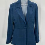 CAbi Blazer Womens 6 Dark Blue Windowpane Check Plaid Casual Jacket Career #5475 Dark blue windowpane check plaid blazer is single-breasted with one button closure. Unlined. Women’s size 6. Polyester/rayon/spandex blend; machine washable. Garment has been cleaned per manufacturer instructions. SEE PHOTOS FOR DETAILS AND APPROXIMATE FLAT LAY MEASUREMENTS TO DETERMINE FIT. Photo 0