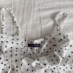 Brandy Melville black and white polka dot babydoll top Photo 1