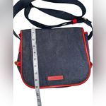 Dooney & Bourke  denim messenger bag with red leather trim Photo 1