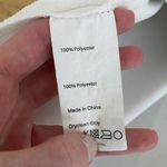 Derek Lam Collective Split Hem Pipe Edge Bell sleeve Blouse in White & Black Photo 4