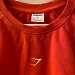 Gymshark Apollo Graphic Long Sleeve Crop Top Size Small Orange Photo 2