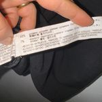 Only Is used  twice,it has some peeling in the front not noticeable,see last picture,runs small Photo 5