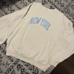 Brandy Melville John Galt “New York” Yellow Crewneck Photo 0