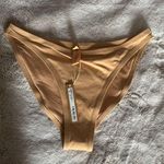 SKIMS  SIGNATURE SWIM MID COVERAGE BOTTOM I OCHRE Photo 0